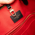 Louis Vuitton On The Go Monogram Reverse MM Handbag