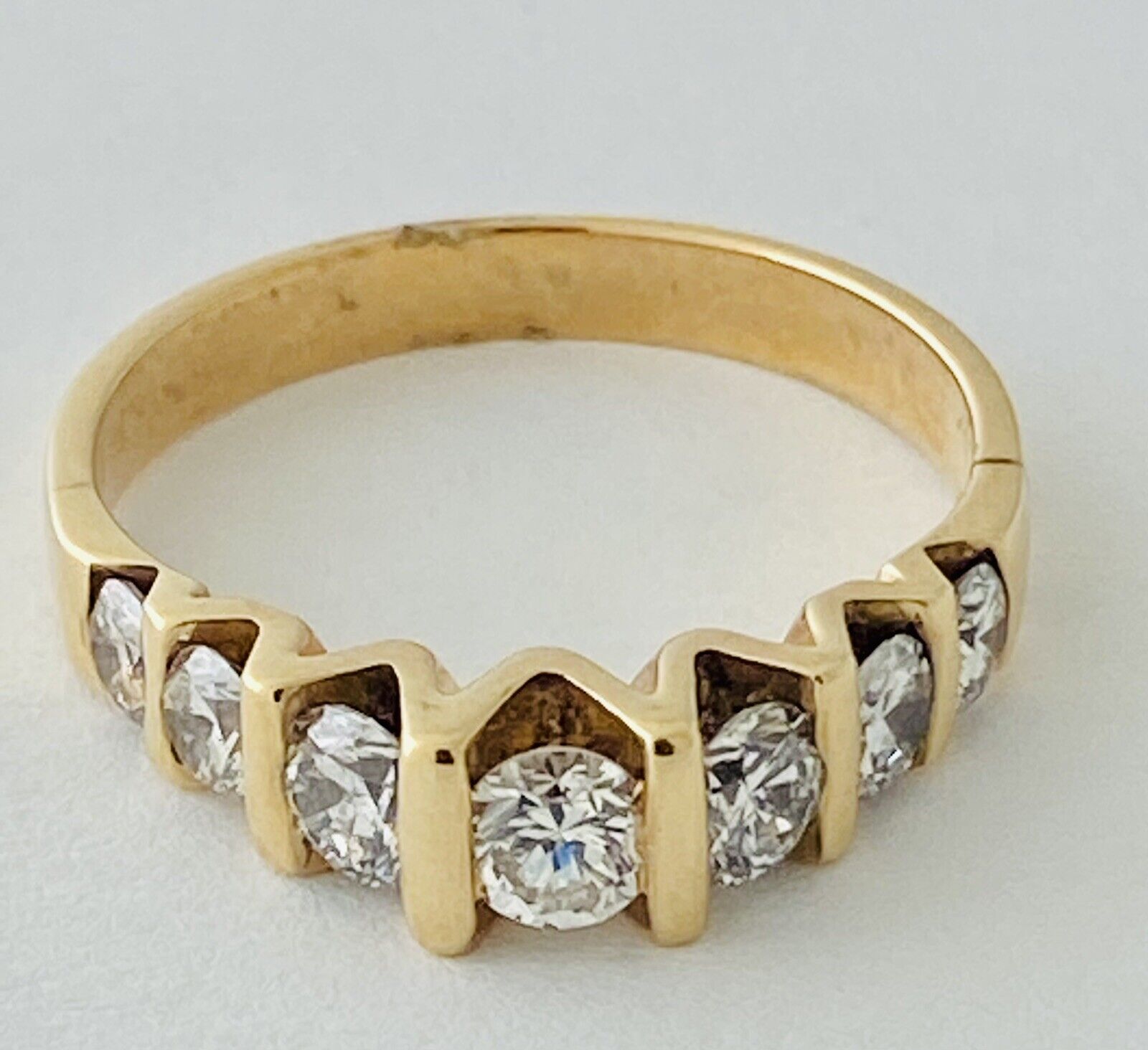14kt Yellow Gold Seven Diamonds Cannel Set Ring