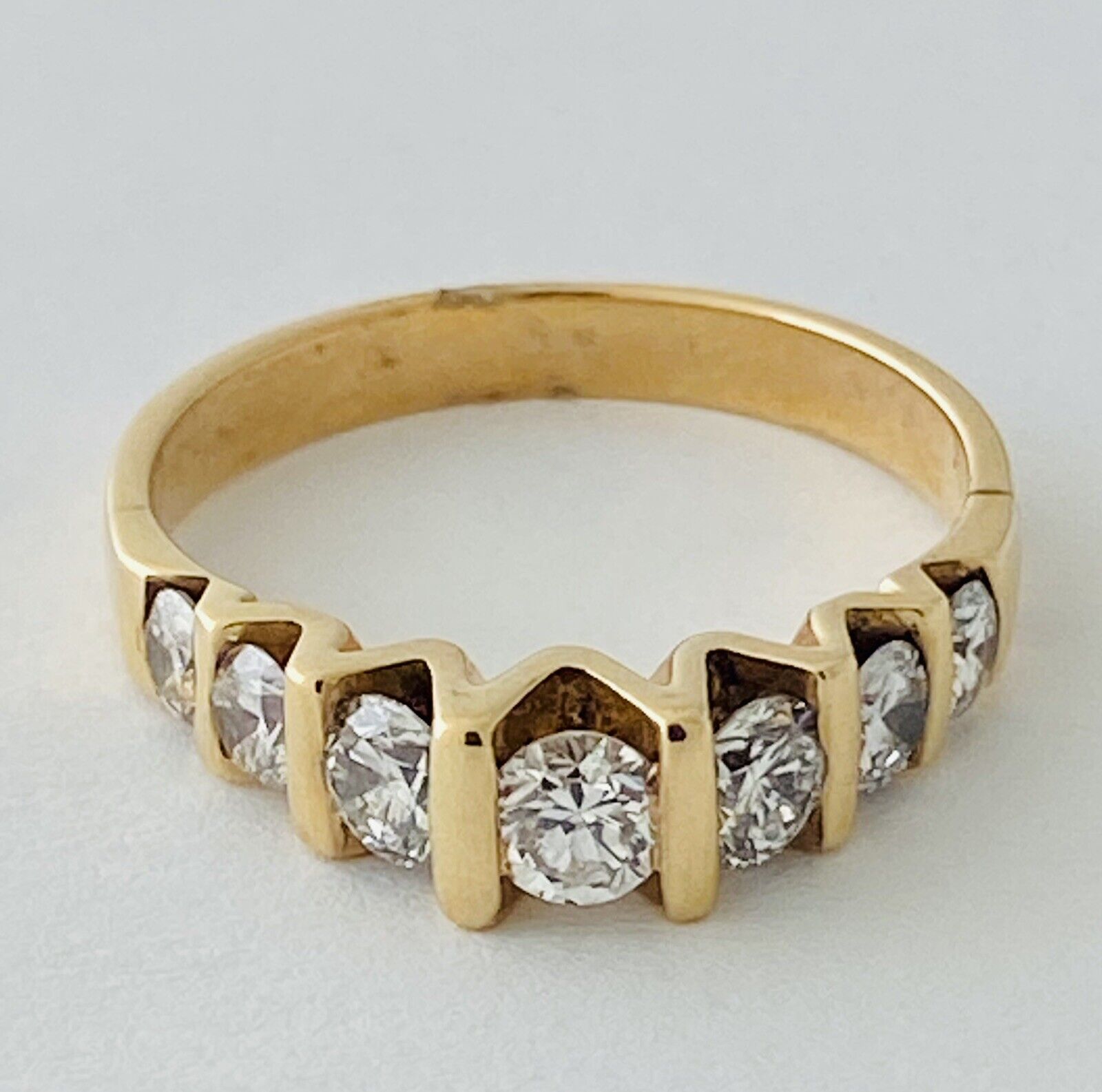 14kt Yellow Gold Seven Diamonds Cannel Set Ring