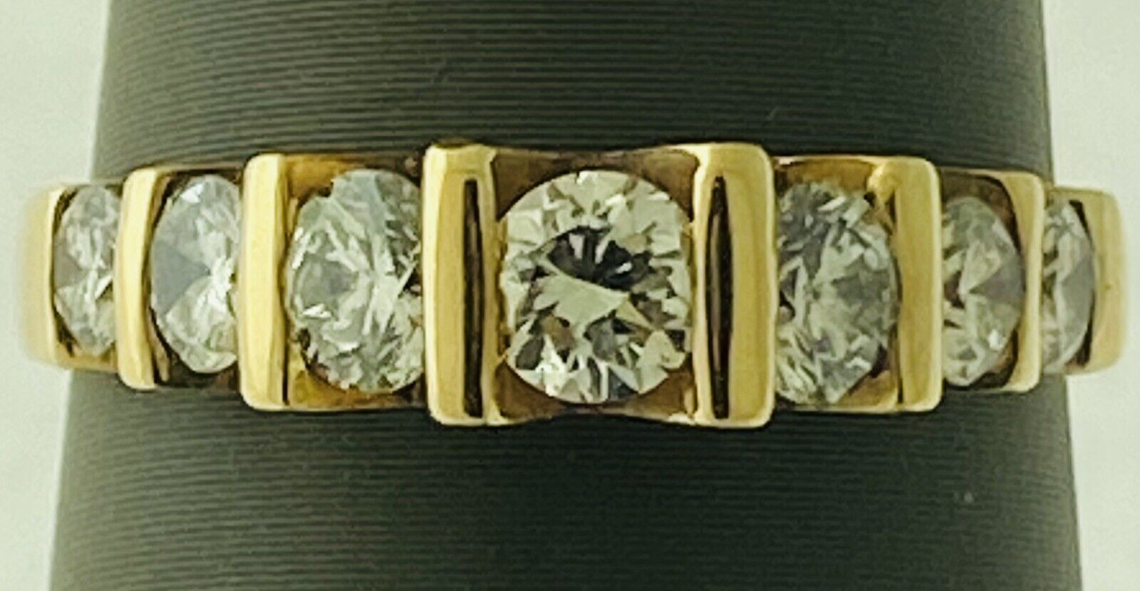 14kt Yellow Gold Seven Diamonds Cannel Set Ring