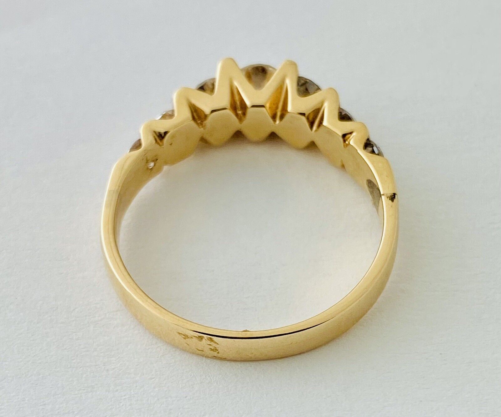 14kt Yellow Gold Seven Diamonds Cannel Set Ring