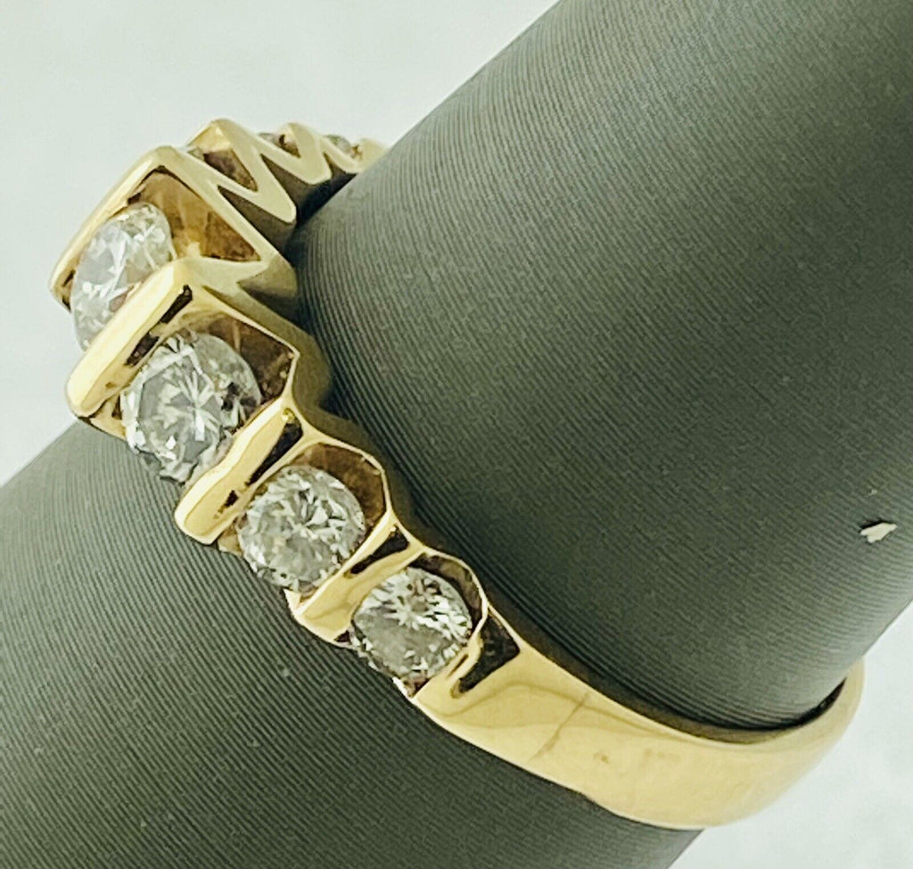 14kt Yellow Gold Seven Diamonds Cannel Set Ring