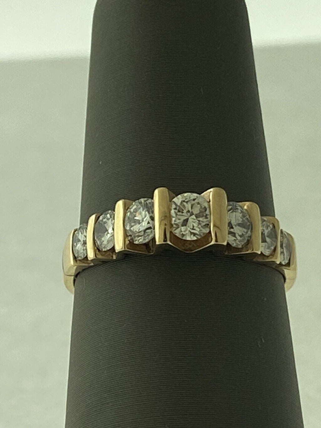 14kt Yellow Gold Seven Diamonds Cannel Set Ring