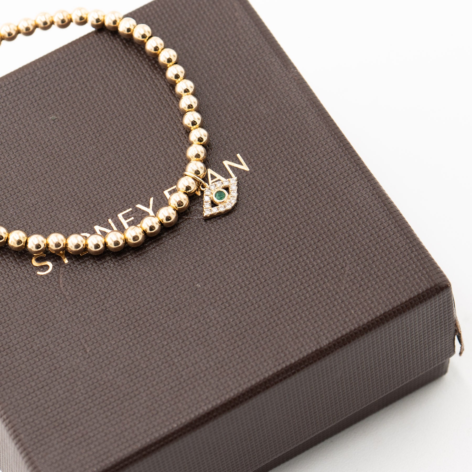 14k Yellow Gold Bead Evil Eye Charm Bracelet