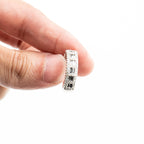 10k White Gold Round & Baguette Cut Diamond Ring