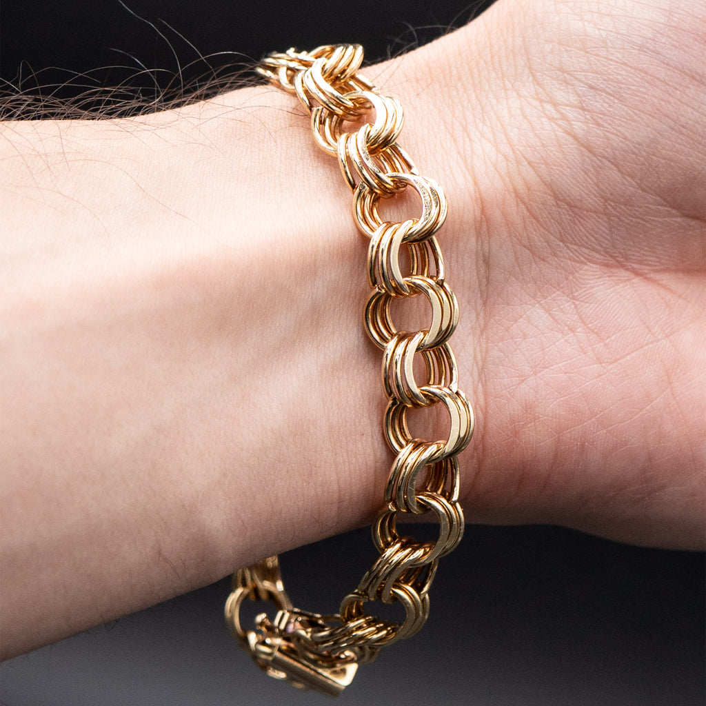 14k Yellow Gold Tripple Ring Charm Bracelet