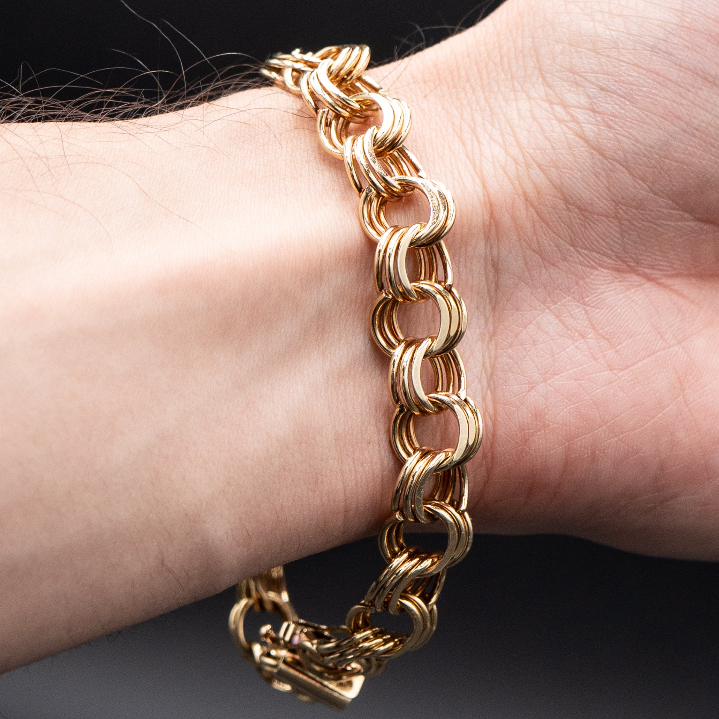 14k Yellow Gold Tripple Ring Charm Bracelet
