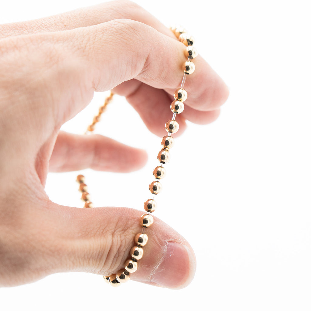 14k Yellow Gold Bead Evil Eye Charm Bracelet