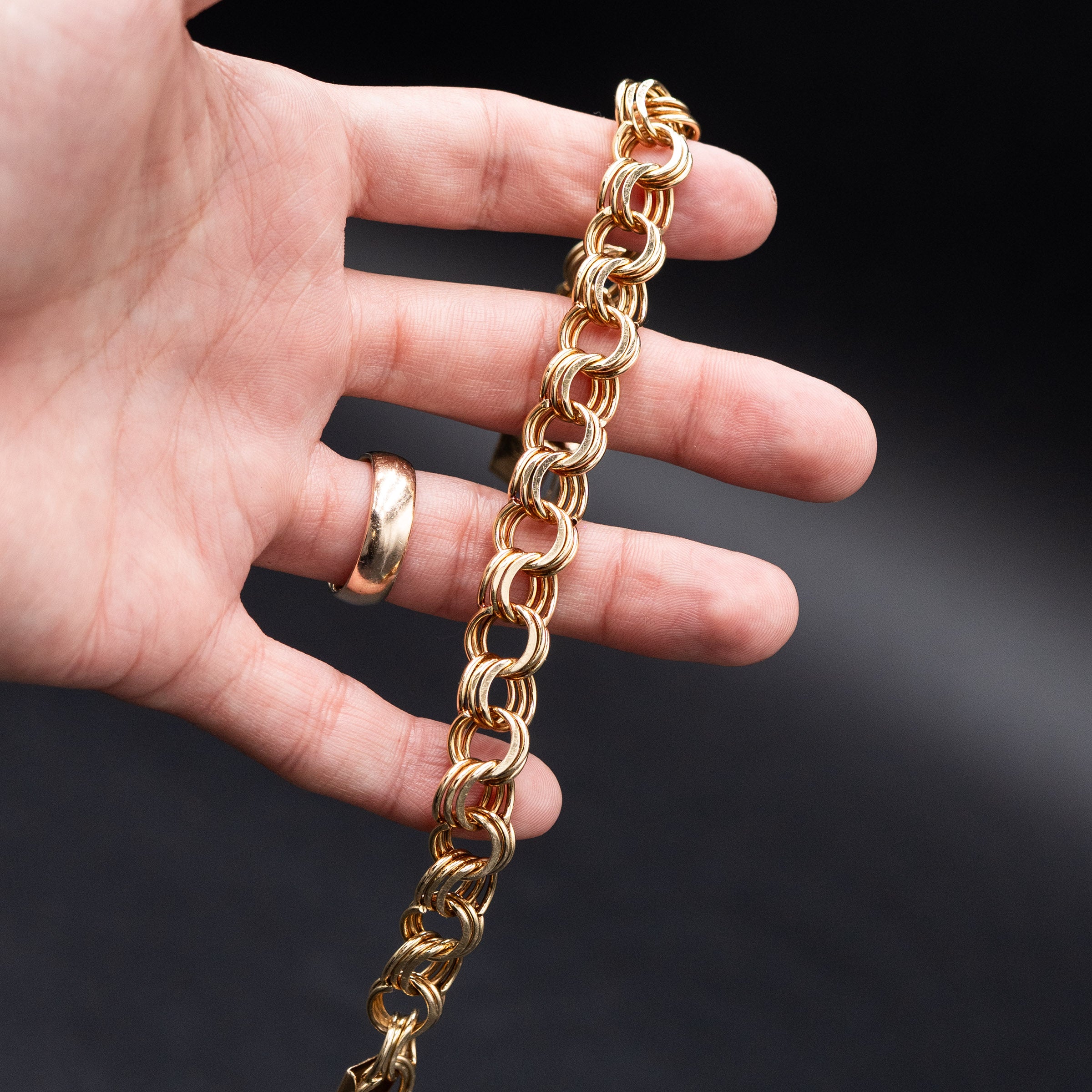 14k Yellow Gold Tripple Ring Charm Bracelet