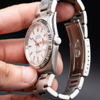 Pre-owned Rolex 16234 Datejust white dial stainless steel watch with box and papers