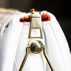 LOUIS VUITTON Monogram Embossed Coussin PM White Handbag