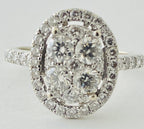 14kt White Gold , Round Diamonds Forming An Oval Shape With Pave Halo