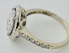 14kt White Gold , Round Diamonds Forming An Oval Shape With Pave Halo