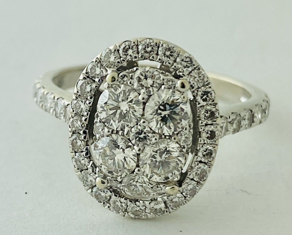 14kt White Gold , Round Diamonds Forming An Oval Shape With Pave Halo