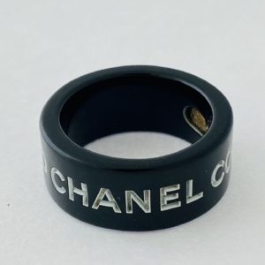 CHANEL Black With White Writing Plastic Ring
