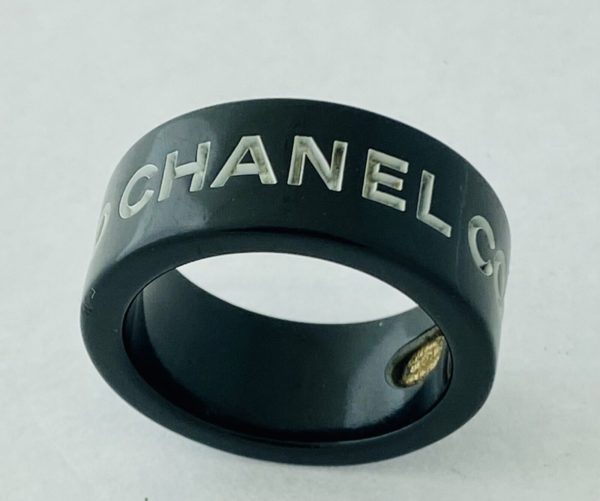 CHANEL Black With White Writing Plastic Ring